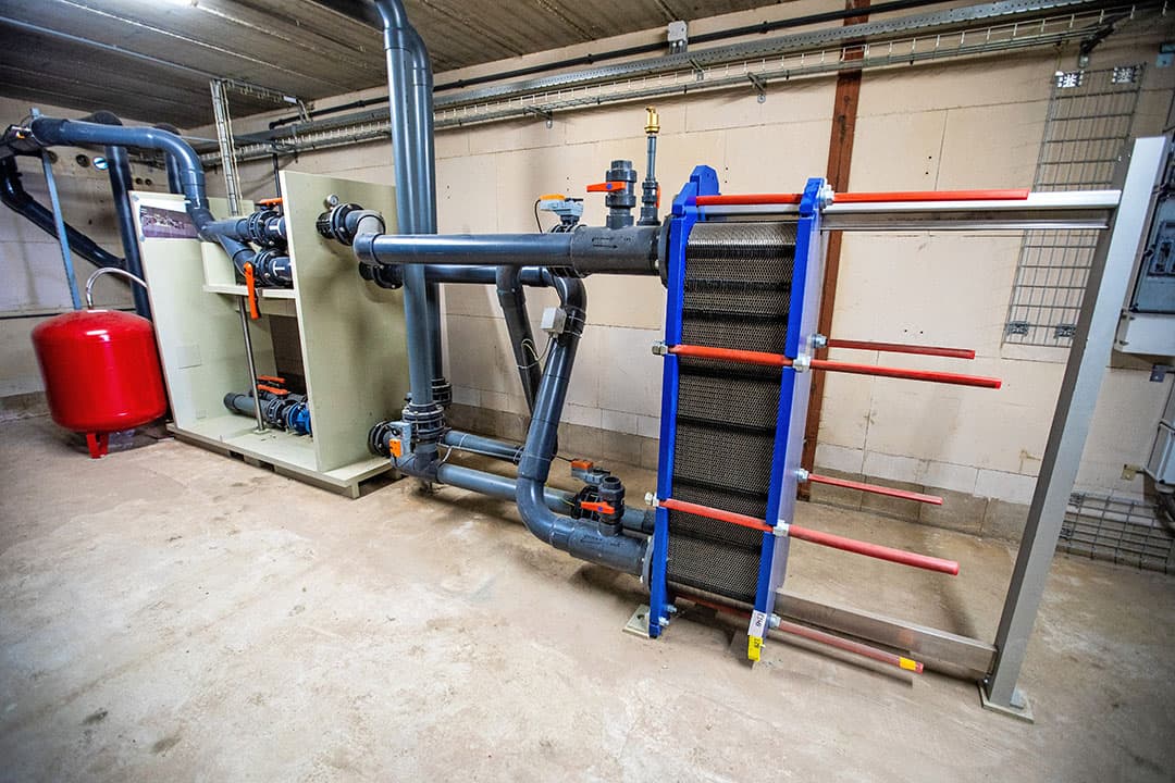 en warmtewisselaar waarmee de warmte uit het waswater gebruikt wordt om inkomende lucht voor te verwarmen. - Foto's: Bert Jansen