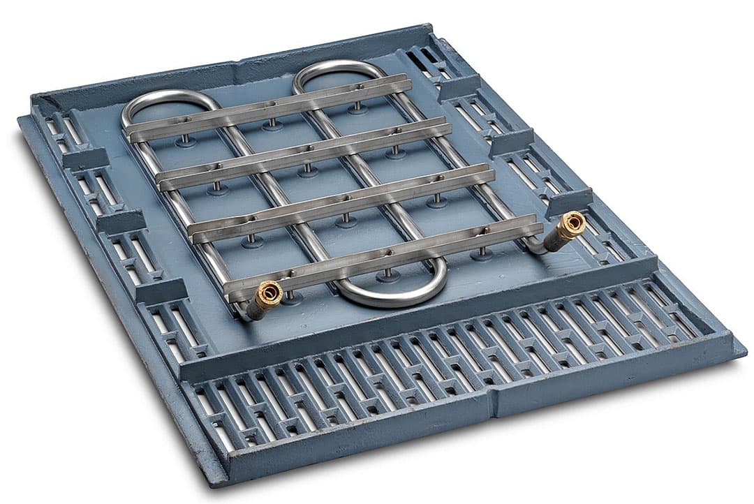 De gietijzeren schouderplaat is van de onderzijde voorzien van leidingen waardoor water wordt gepompt. -Foto: Nooyen Pig Flooring