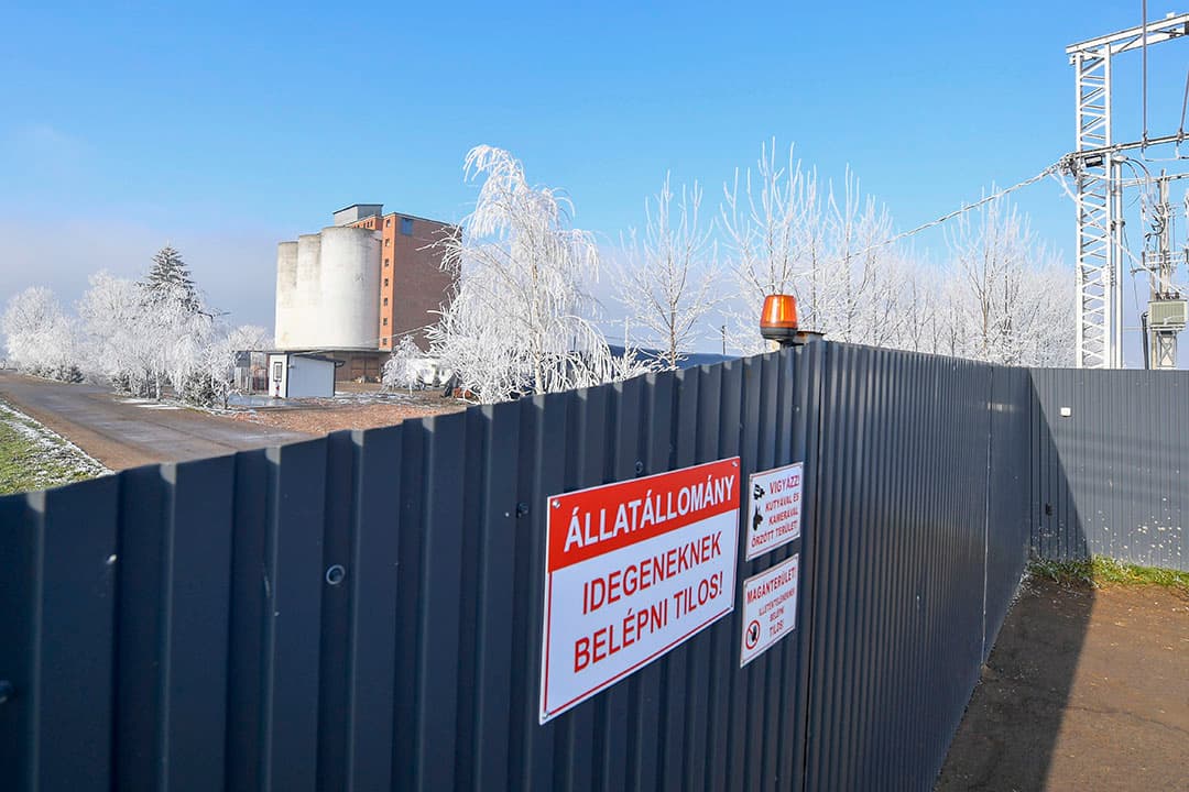 epa08130254 A sign reading 'animal stock - no entry' is seen on the closed gate of a duck breeding farm in Letavertes, Hungary, 15 January 2020. The slaughtering of the birds started after poultry infected with the H5N8 virus of the bird flu were detected at the farm, the Chief Veterinary Officer of Hungary announced on 15 January.  EPA/ZSOLT CZEGLEDI HUNGARY OUT