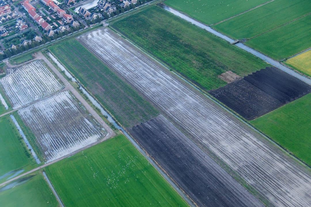 Zo ver je kijkt, staat water op het land.