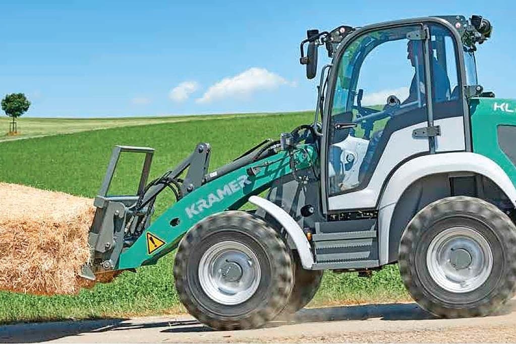 Kramer lift mee met John Deere