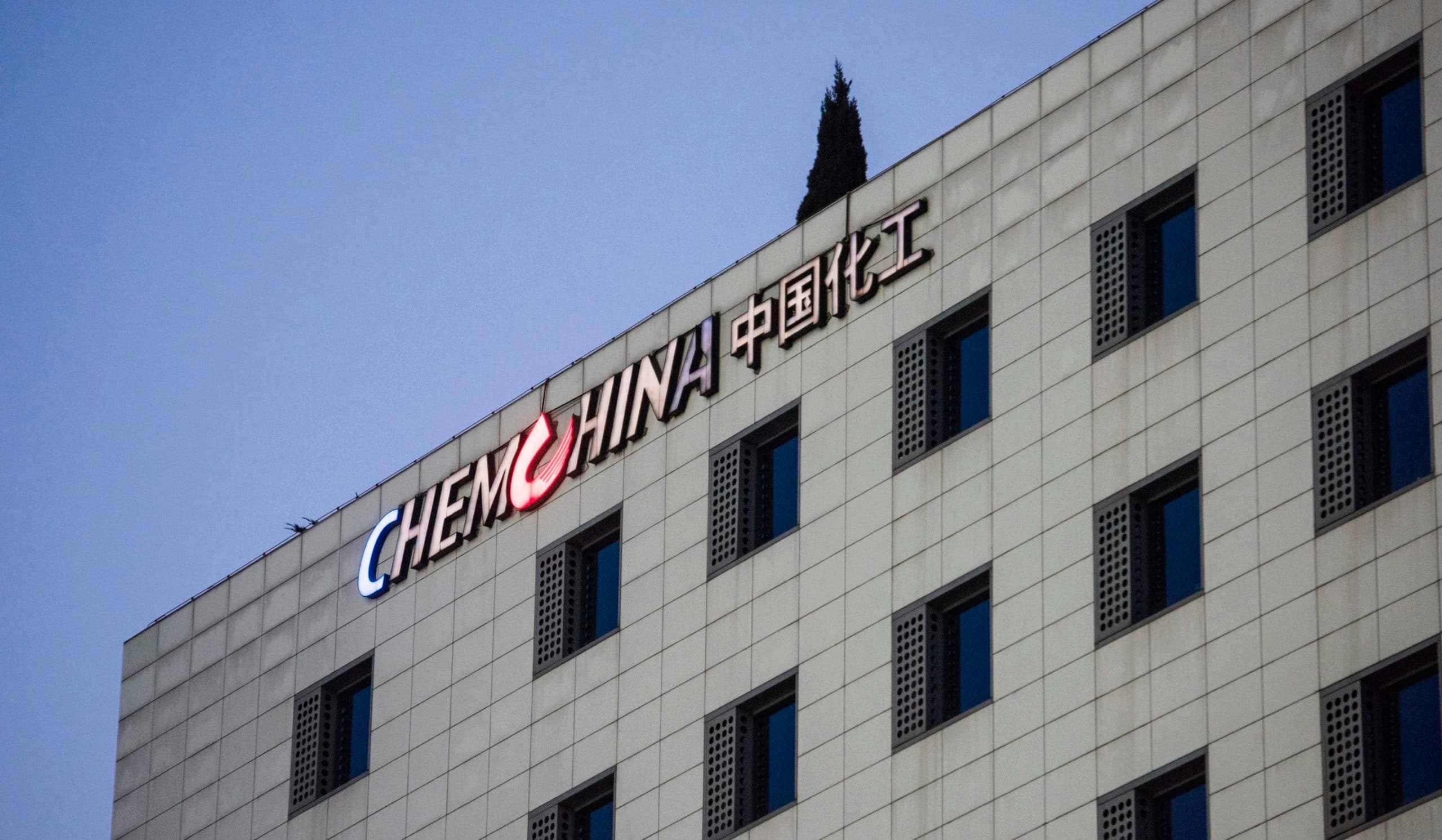 2016-02-03 18:58:12 (FILES) This file photo taken on February 3, 2016 shows a general view of a building of the China National Chemical Corp., also known as ChemChina, in Beijing. US antitrust regulators approved ChemChina's takeover of Swiss pesticide and seed giant Syngenta after requiring the Chinese company to sell three pesticides, the Federal Trade Commission said on April 4, 2017. The US agency required the divestitures to address a loss of competition over the herbicide paraquat and two other products in which the merger would have likely led to higher prices for consumers, the FTC said. / AFP PHOTO / Fred DUFOUR